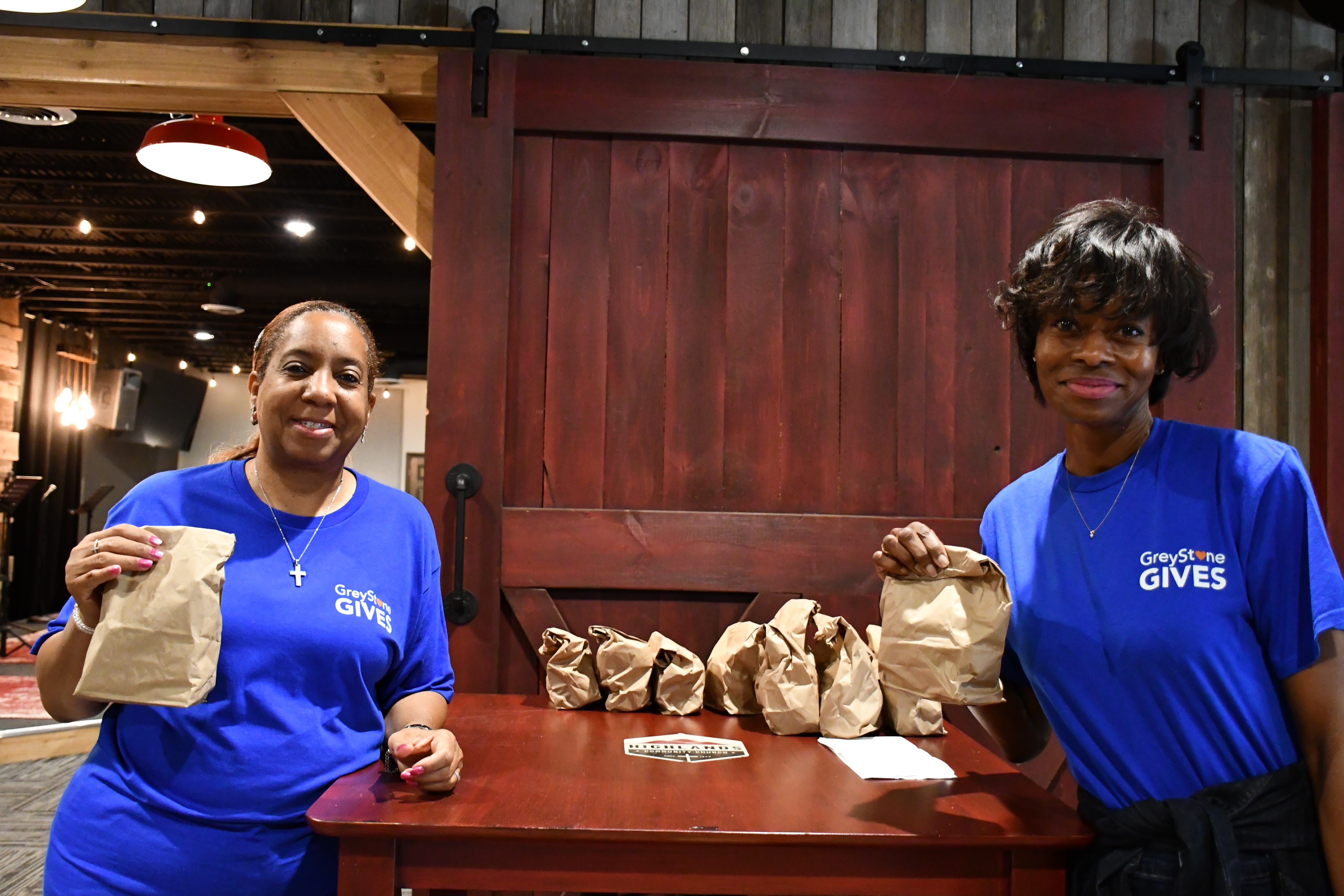 women holding bags