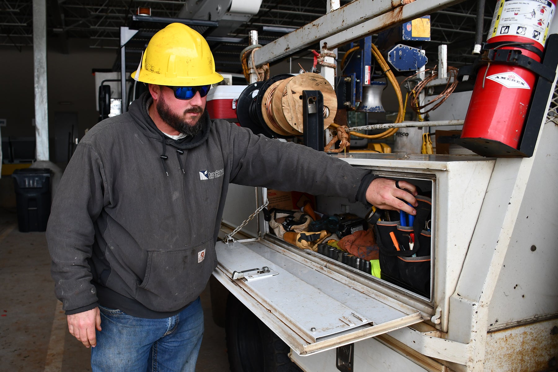 lineman preparing tools